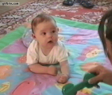 1389808892_baby_follows_toy_with_eyes