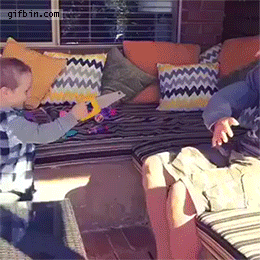 kid_cuts_guys_fake_arm_with_toy_saw