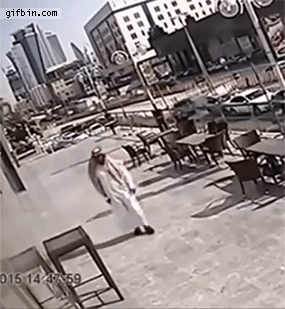 giant_mirror_falls_on_guy_walking_on_the_street