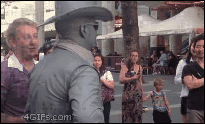 Jerk-bothers-cowboy-street-performer
