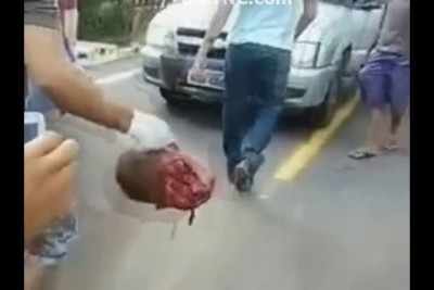 Shocking Video shows Man Decapitated in Motorcycle Accident has his Head carried down the Road by th