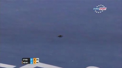 Poor ball girl asked to catch huge bug at the Australian Open 2012