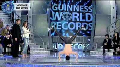 Мировой рекорд вращения на голове