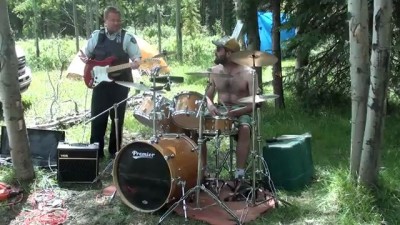 Coolest cop ever playing drums in the woods