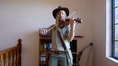 Lara plays the Indiana Jones Theme as Indy (violin)