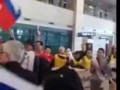 в Южной Корее встречают спортсменов из России