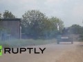 Ukraine: Anti-Kiev IFV drives through Slavyansk, shoots at Ukrainian forces
