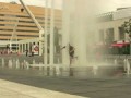 longboarder fail in a Montreal Fountain