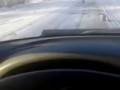Бабушка посыпает песком дорогу в свое село. Благовещенский район Башкирии