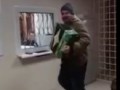 Рюмка водки на столе под баян в полицейском участке