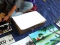 Юный уличный художник